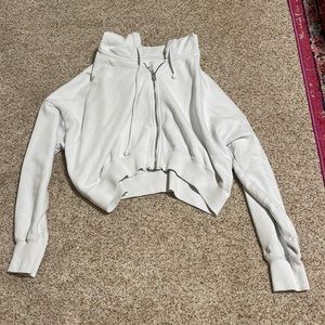 White Hollister cropped zip up hoodie. Size M
